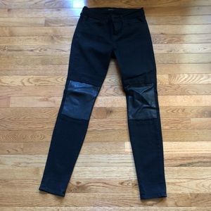 Black skinny jeans with leather latch detail